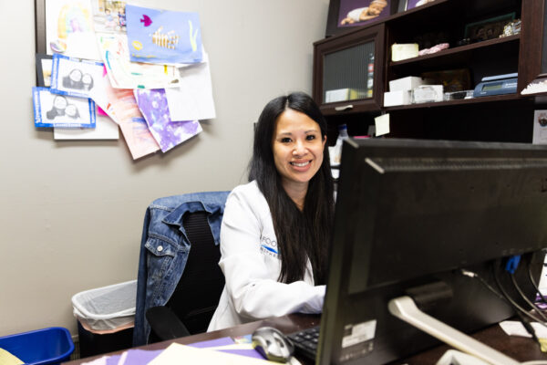 Provider Tanya Tang in her office.